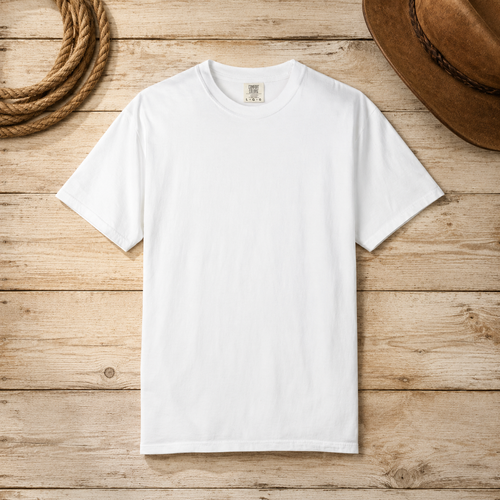 Black graphic t-shirt featuring a vintage dandelion illustration with the phrase "Born to Live Free, Ridin' on a Breeze."
